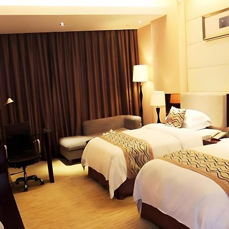 Fortune Hotel Лунъян Экстерьер фото