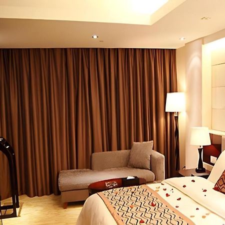 Fortune Hotel Лунъян Экстерьер фото