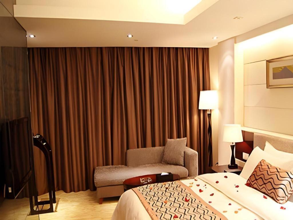 Fortune Hotel Лунъян Экстерьер фото