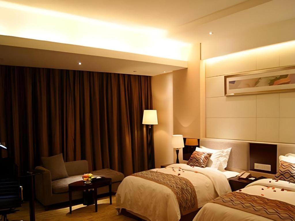 Fortune Hotel Лунъян Экстерьер фото