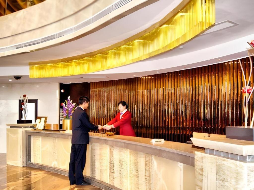 Fortune Hotel Лунъян Экстерьер фото