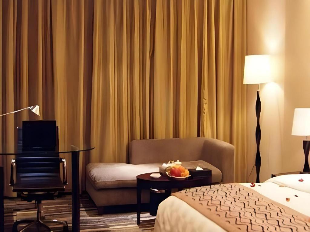 Fortune Hotel Лунъян Экстерьер фото