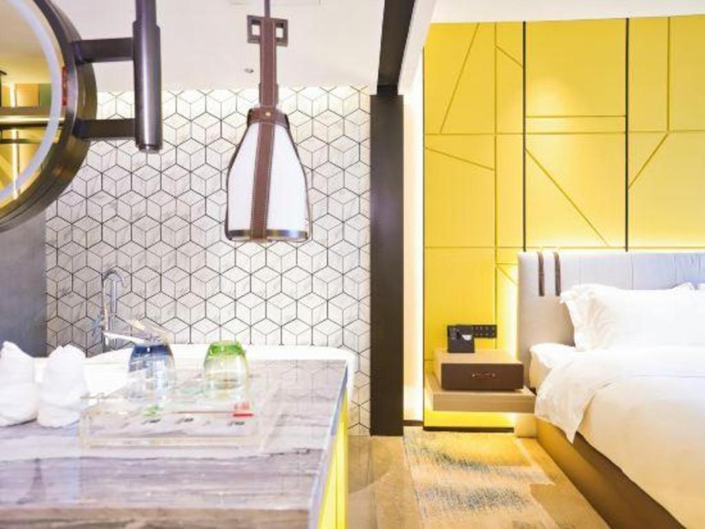 Fortune Hotel Лунъян Экстерьер фото