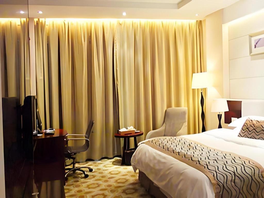 Fortune Hotel Лунъян Экстерьер фото