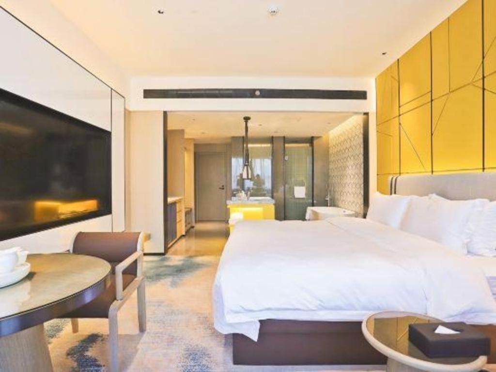Fortune Hotel Лунъян Экстерьер фото