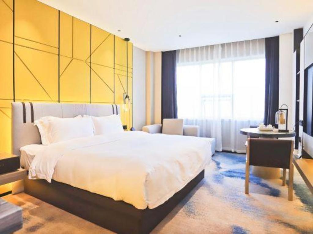 Fortune Hotel Лунъян Экстерьер фото