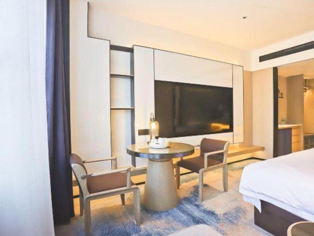 Fortune Hotel Лунъян Экстерьер фото