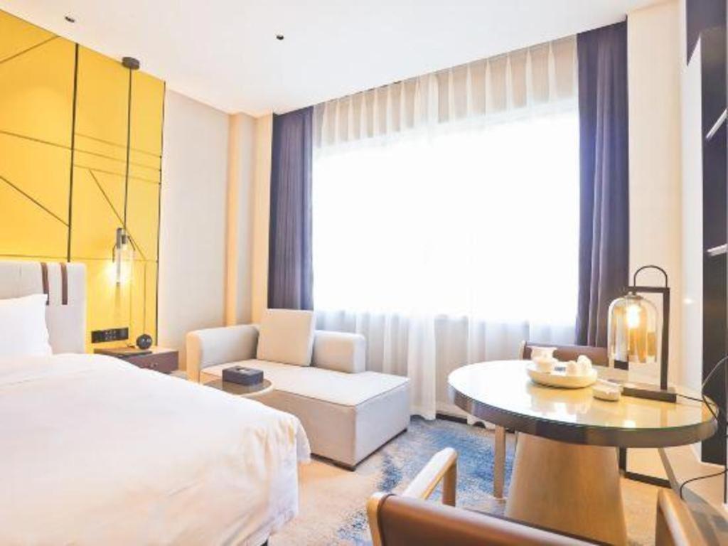 Fortune Hotel Лунъян Экстерьер фото