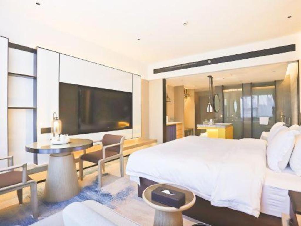Fortune Hotel Лунъян Экстерьер фото
