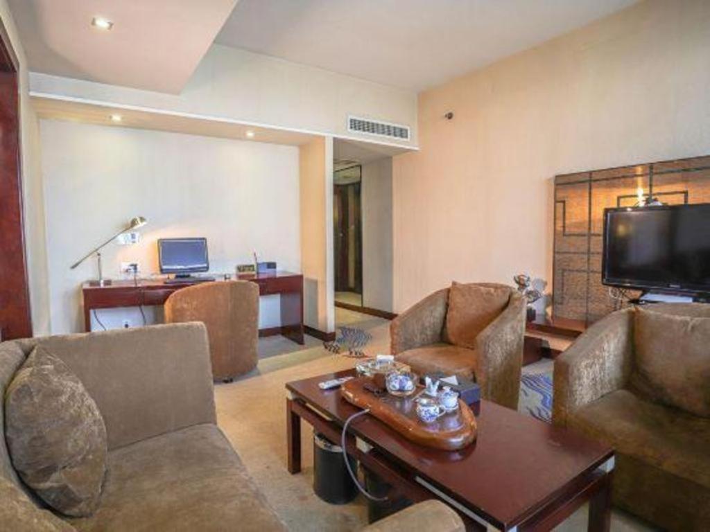 Fortune Hotel Лунъян Экстерьер фото
